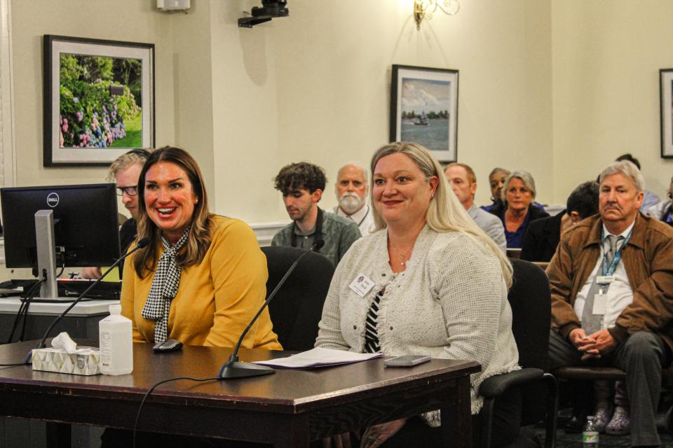 Rachel Smith (left) and Jenna Marchi (right) present to Council on hunger and homelessness issues in our community.