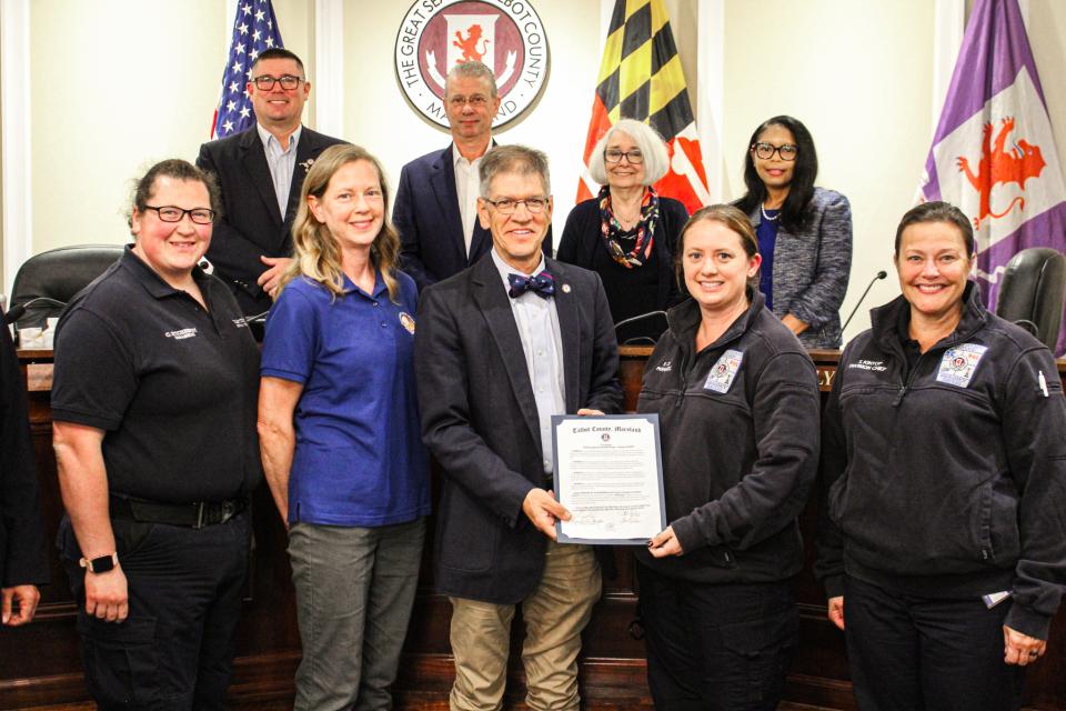Council Vice President Pete Lesher presents the proclamation for Mobile Integrated Health (MIH) Week to the Department of Emergency Services and the Talbot County Health Department.