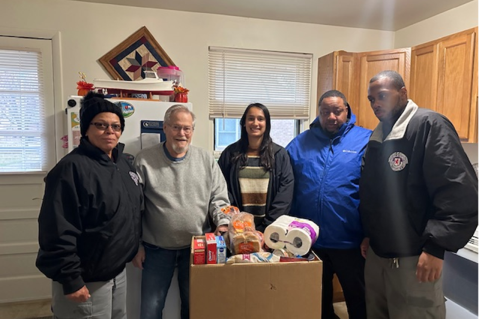Left to right:  Lt. Christine Fields, Mr. Carl Fluharty, Lt. Amanda Tondin, Cpl. Taray Wright, Captain Bobby Johnson