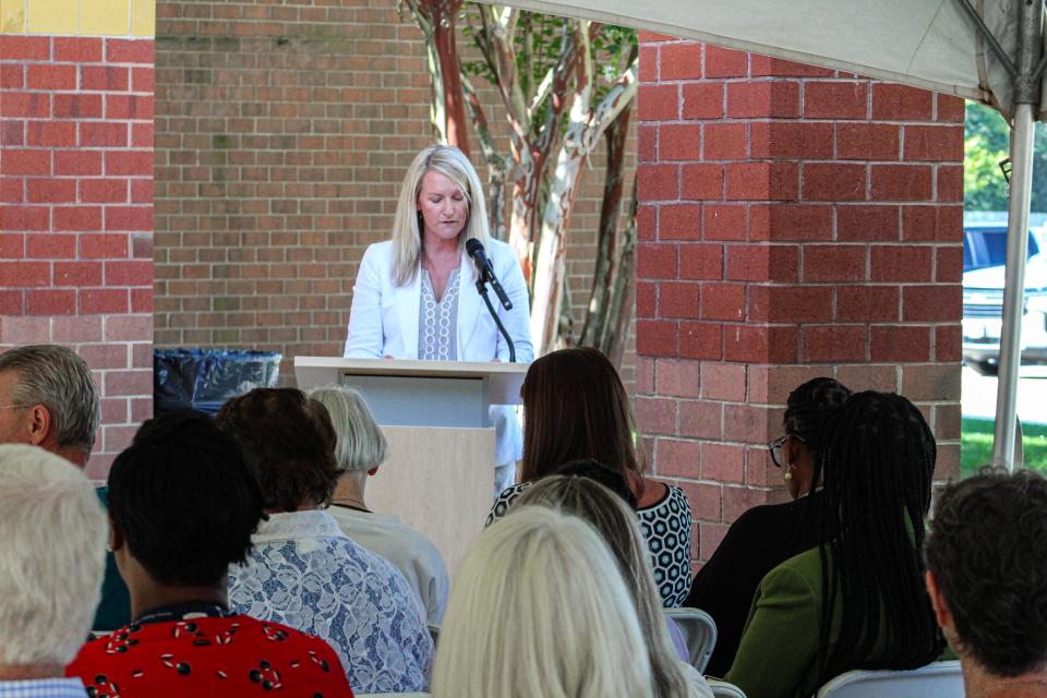Principal Kari Clow gives remarks at groundbreaking.