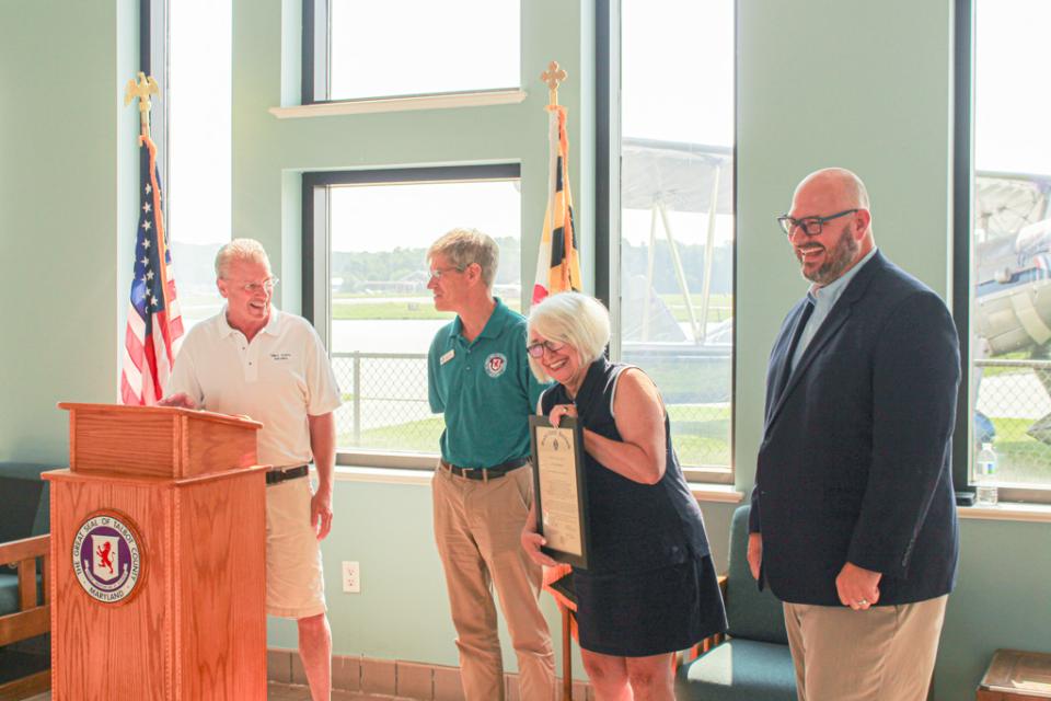 Talbot County Council presents Easton Airport with official Certificate of Recognition.