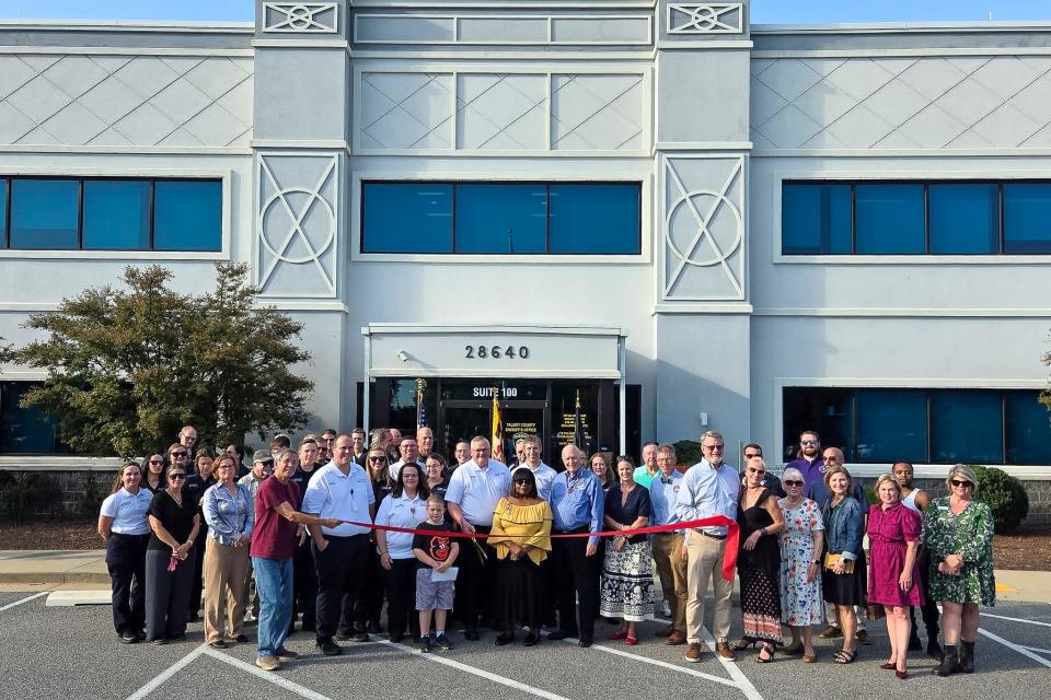 Community members gather for the Ribbon Cutting for the Public Safety Complex, home to the Sherriff's Office and the Department of Emergency Services.